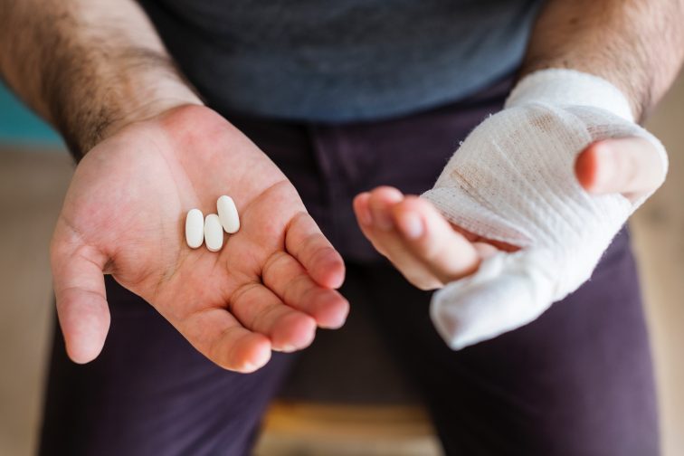 Man with injured hand